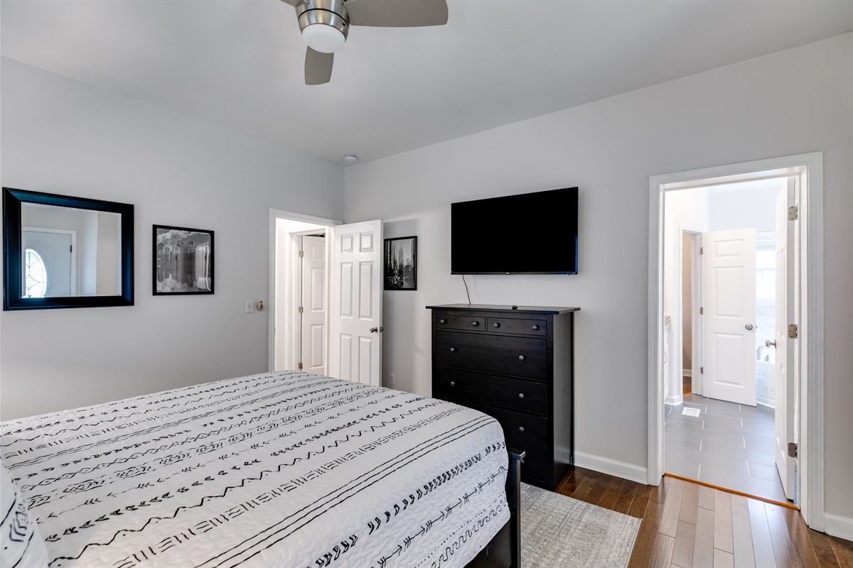 Relax, lounge, and enjoy your favorite shows on the big smart TV in a room designed for both comfort and style.