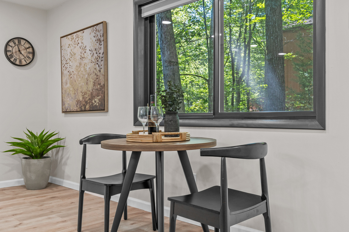 An intimate spot for enjoying your morning brew while looking outside at nature
