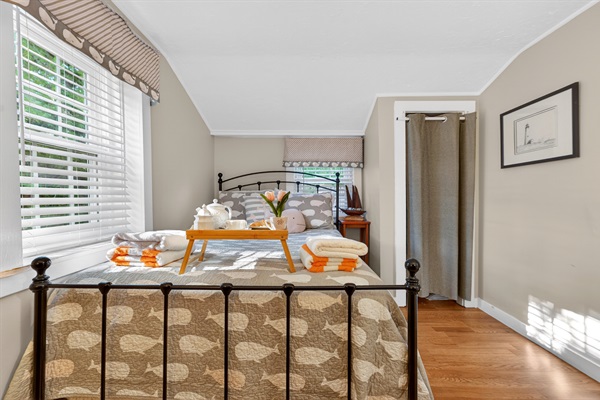 Find your calm in our third bedroom, where a queen bed offers the perfect place to recharge.