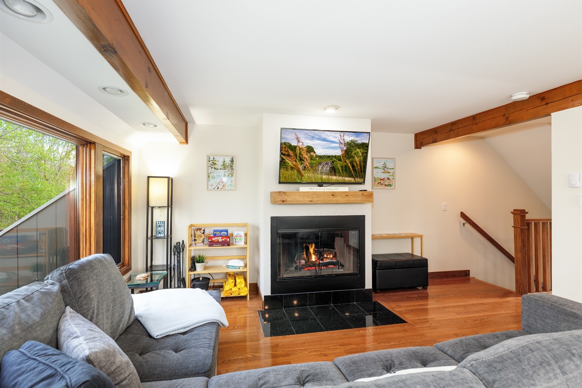Cozy up to the wood-burning fireplace (available seasonally) with a glass of wine and a movie