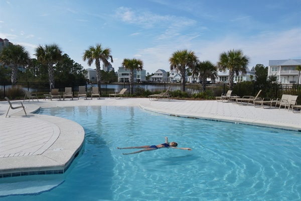 The swimming pool is the perfect place to relax and enjoy on a hot summer day.