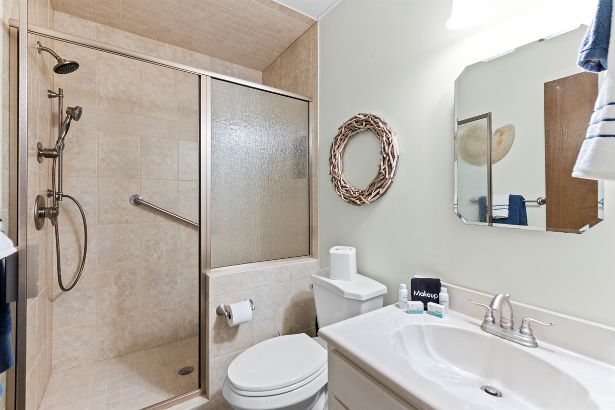 Spa-like Bathroom Retreat: Refresh in a stylish, well-appointed space with modern touches!