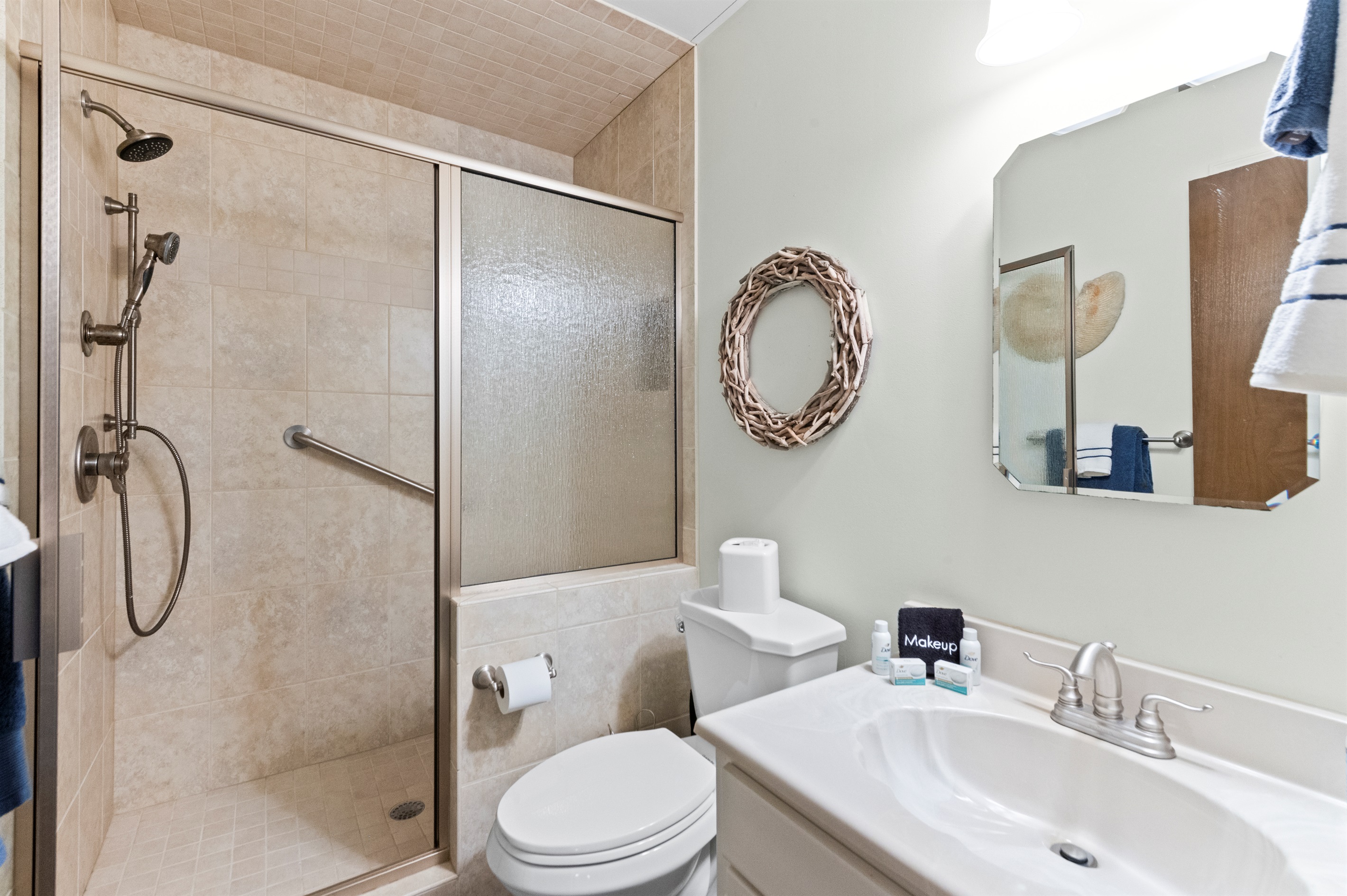 Spa-like Bathroom Retreat: Refresh in a stylish, well-appointed space with modern touches!