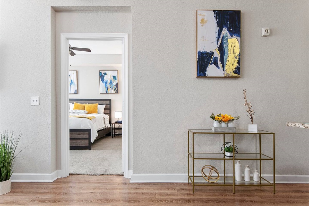 The bedroom sits off the living room and has door that closes and locks for privacy.