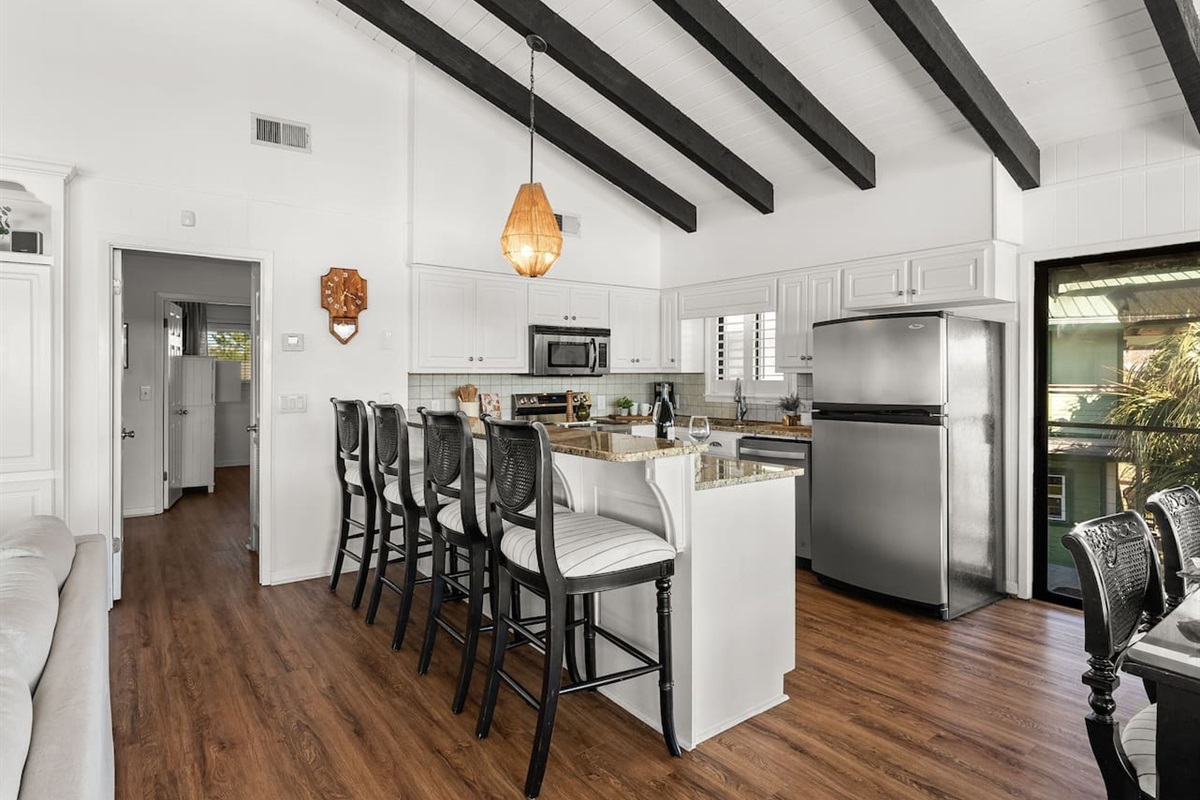 Fully equipped kitchen and additional dining.