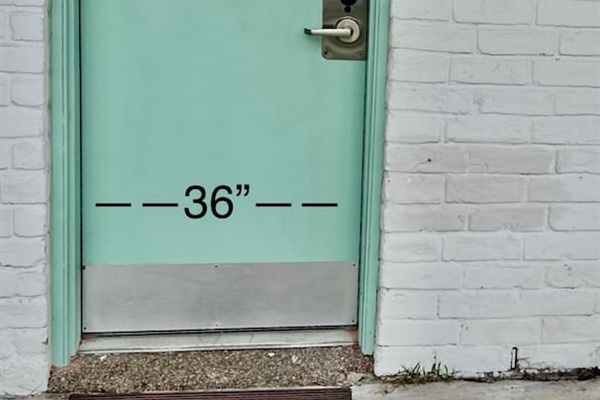 Entrance with a 36-inch door opening and covered access to Unit 144.
