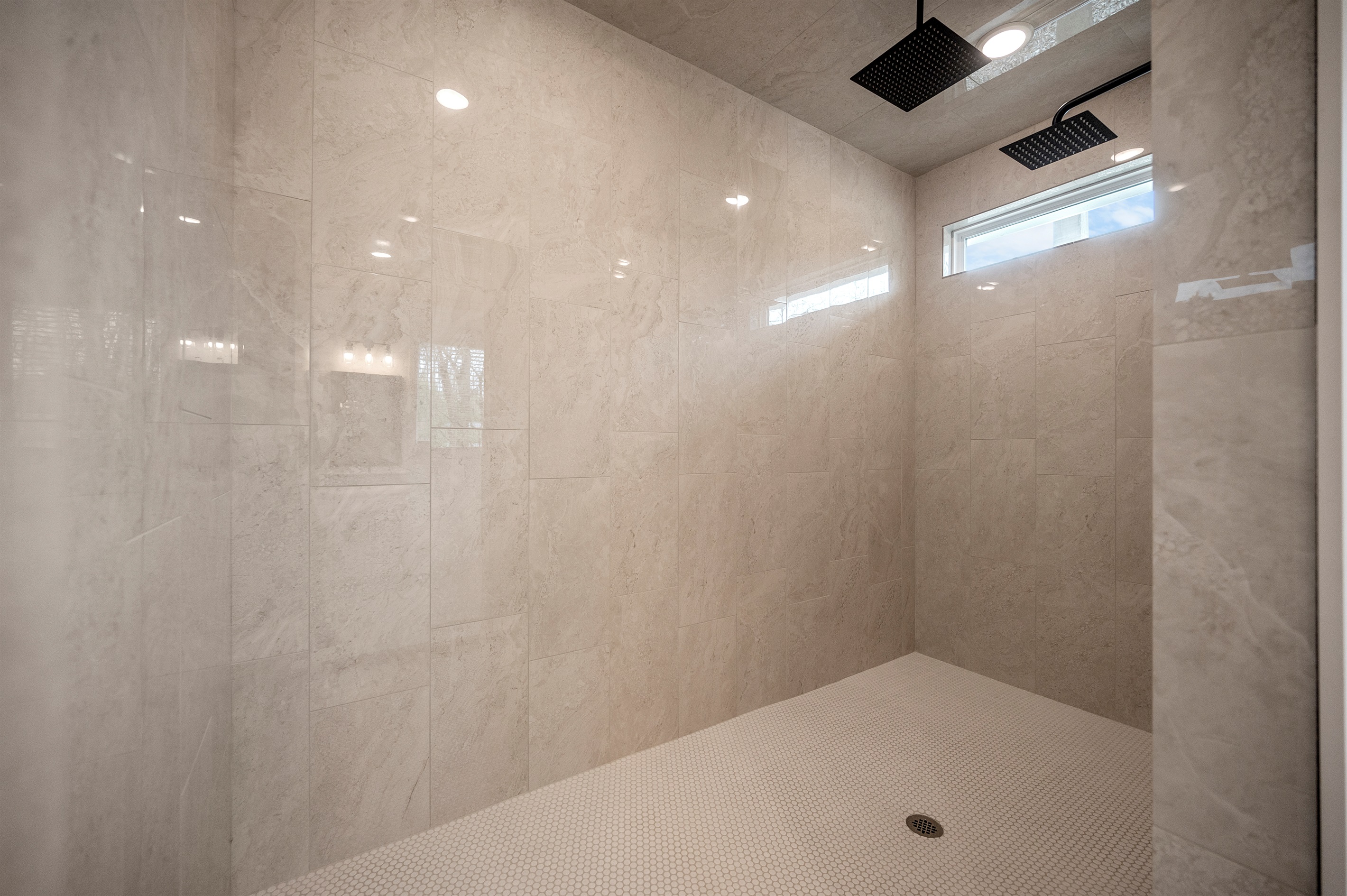 Rainfall showers & plush towels included in every suite