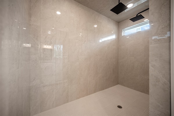 Rainfall showers & plush towels included in every suite
