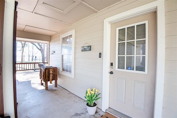 Side entrance under carport to unload no matter the weather.