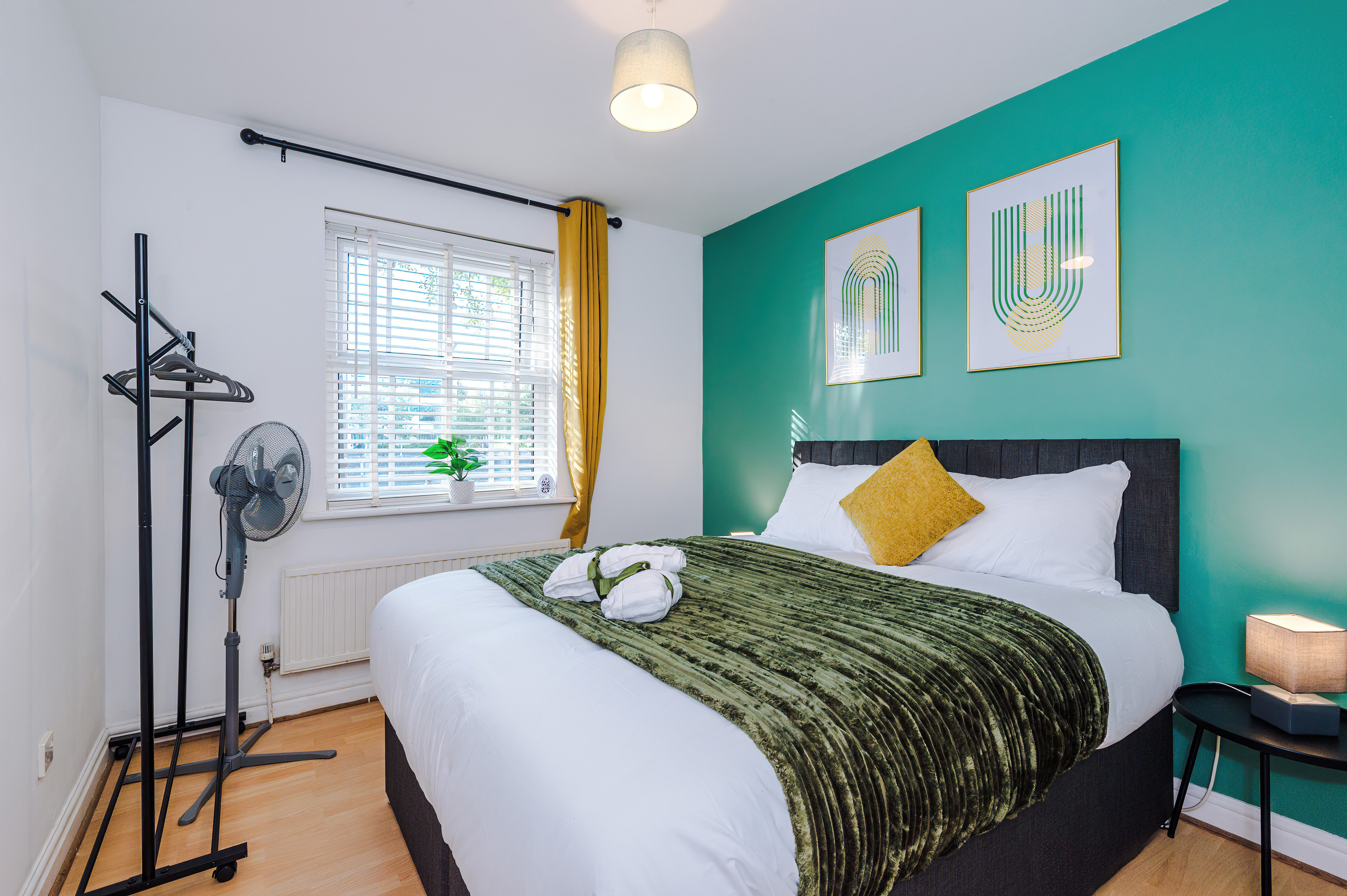Hotel comfort King bed, clothes rail with hangers & blackout curtains