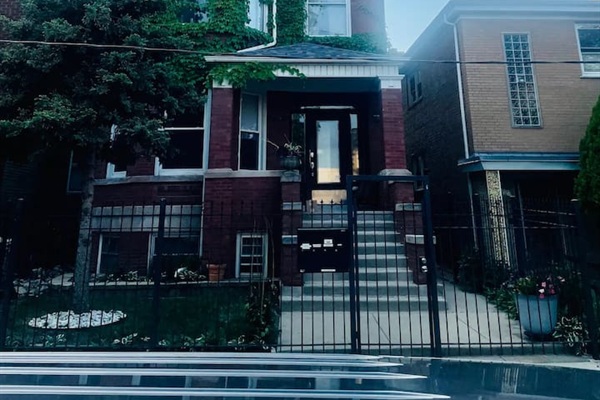 Classic Chicago brick building entrance located in the vibrant Avondale neighborhood.