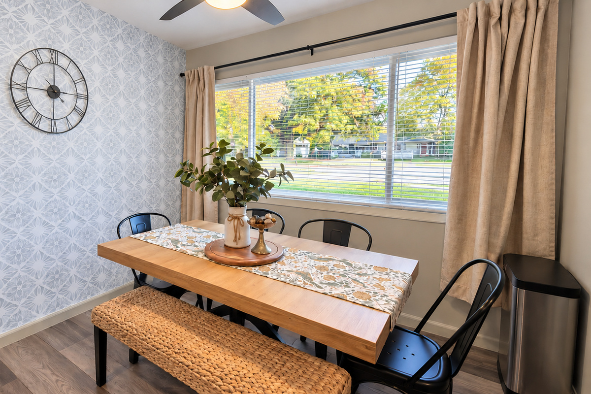Gather around the dining table for meals, games & conversation in this bright, welcoming space.