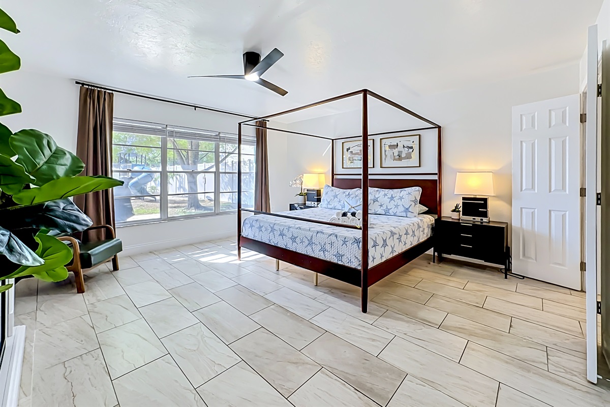 Our master bedroom has a King four-poster bed.