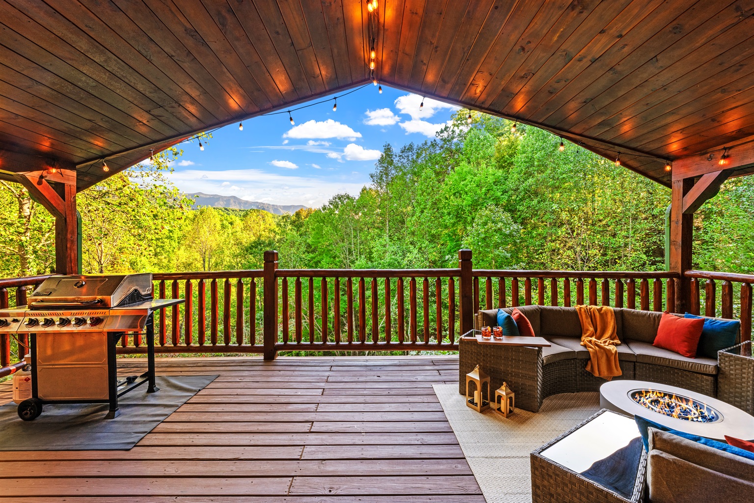 Beautiful endless forest views out of the main floor patio deck. Roomy seating with a fire pit perfect for cozy conversations and lots of laughter