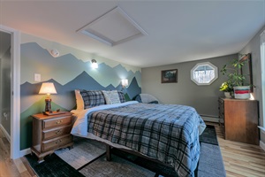 The "Mountain" room with a mountain mural painted by local Maine artists