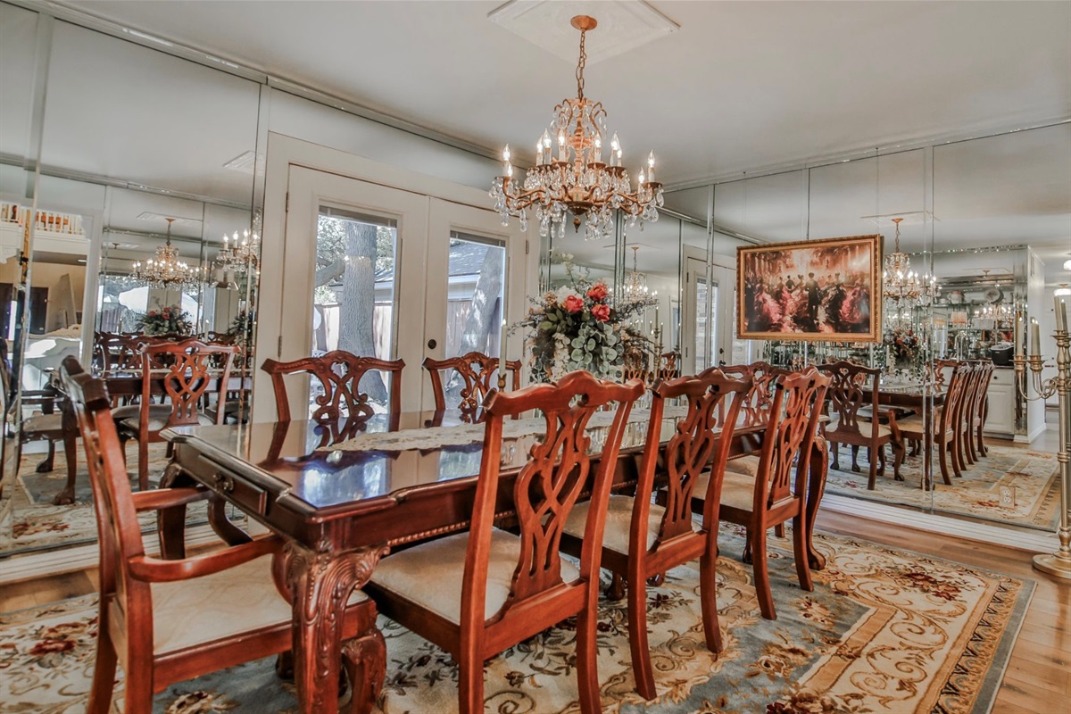 Seating for eight and a wet bar ready—perfect for feasting, toasting, and spilling tea.