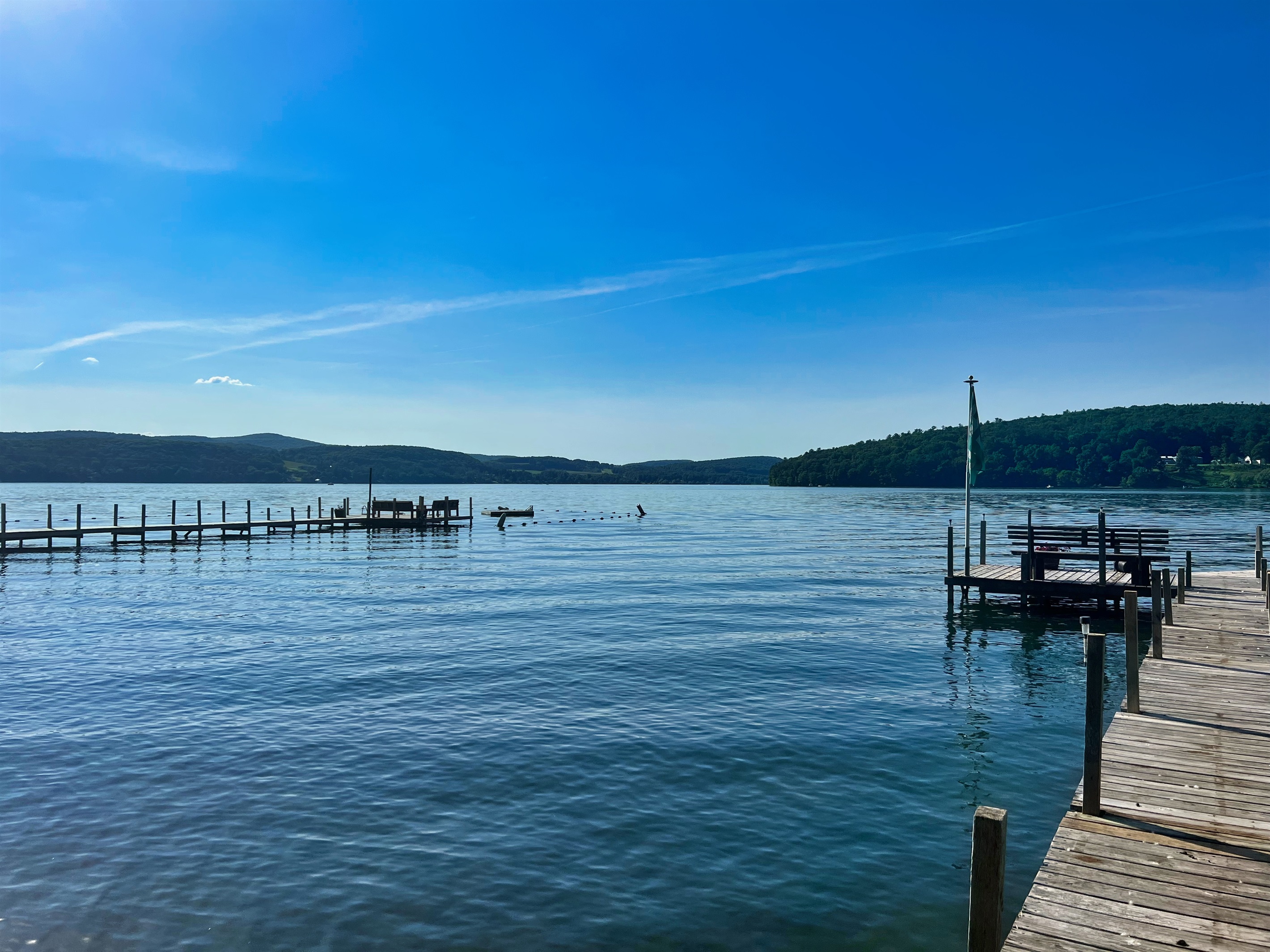 The view from Hyde Bay boating dock looking towards the swim dock, beautiful Otsego lake surrounds.