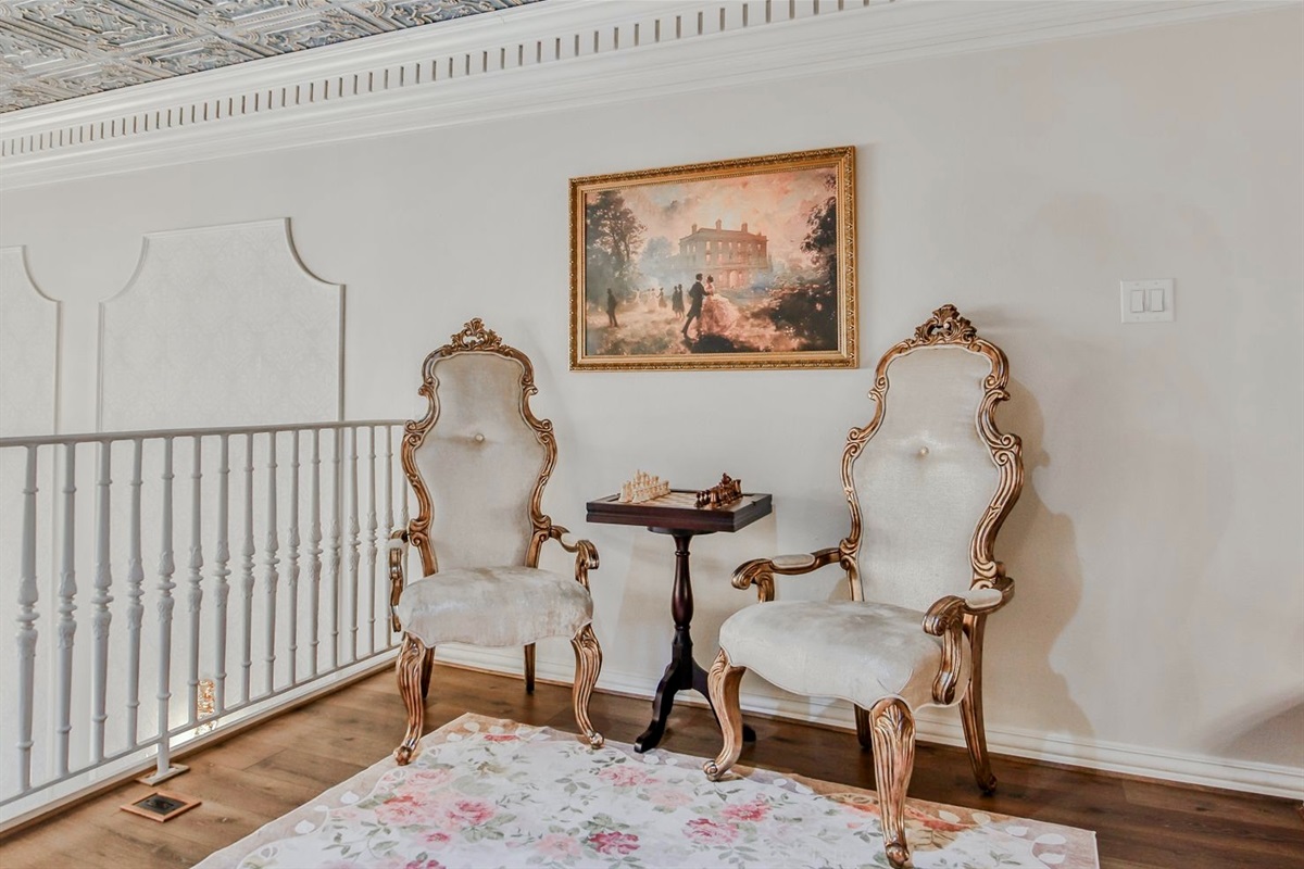 A quiet spot for whispered wagers. Pull up a chair, set the chessboard, and let the game—and the gossip—begin.