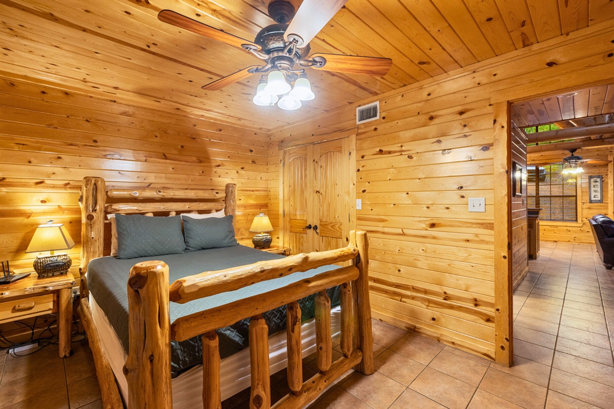 Warm bedroom with rustic style and woodsy feel.