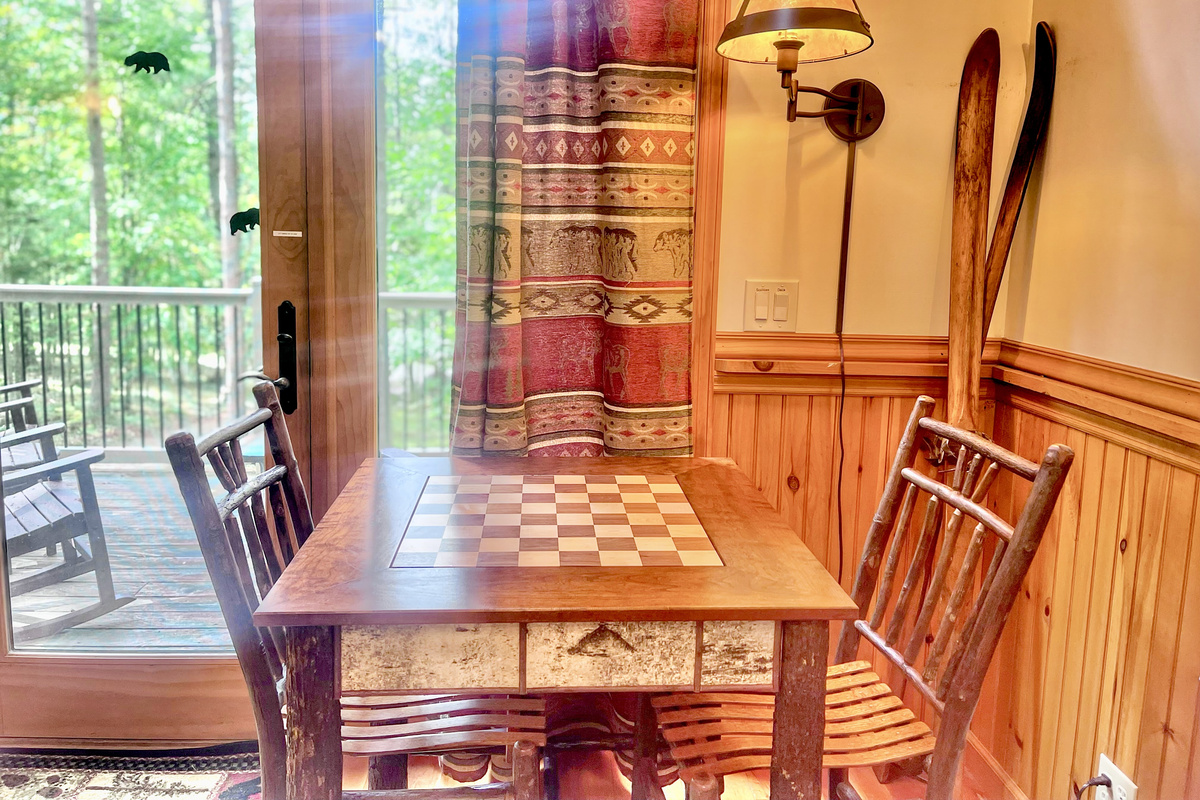 Play chess, or whatever your fancy, at our chess table, located in the warm, stylish living room. 