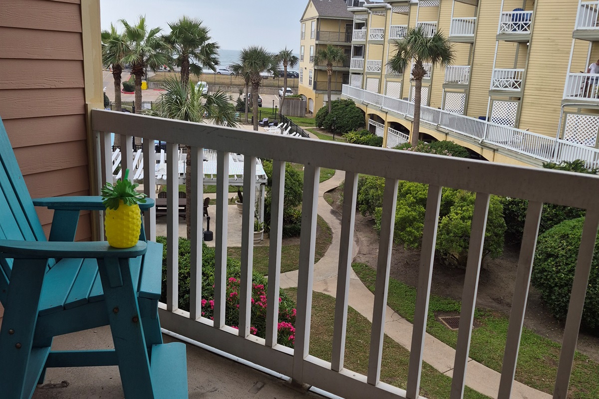 Great balcony overlooking one of the two pools and beyond to the gulf