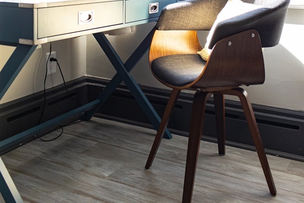 Dedicated workspace with view of backyard