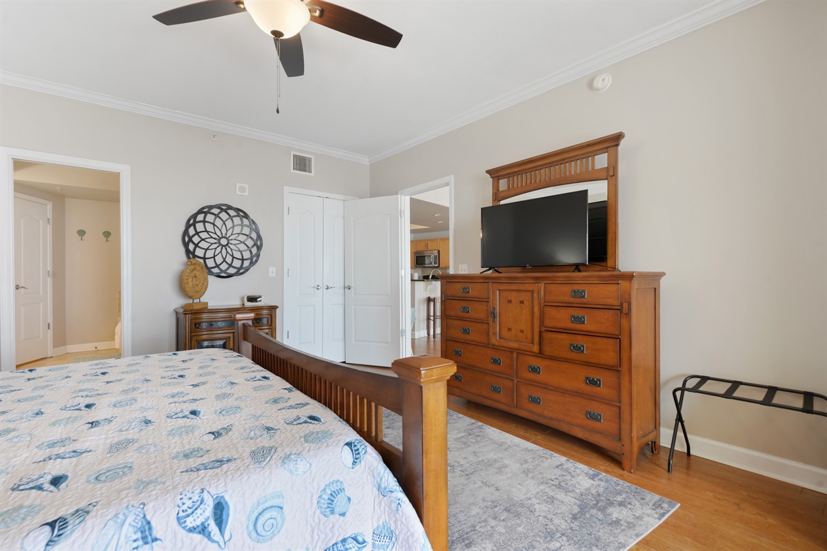Primary bedroom. King bed, balcony access, en-suite bathroom, tv, etc.