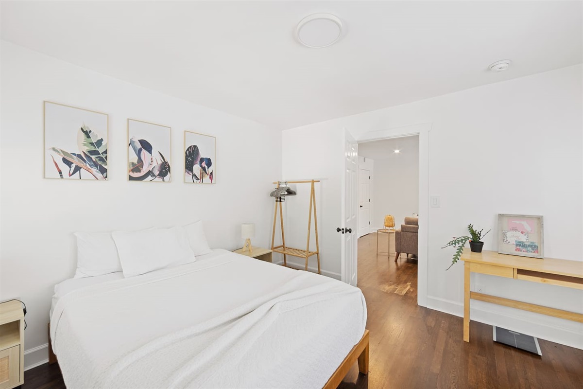 Front bedroom with comfy Queen size mattress.  Also features (not pictured): - workspace with 24" monitor- full length mirror- Iron and standing ironing board- dresser
