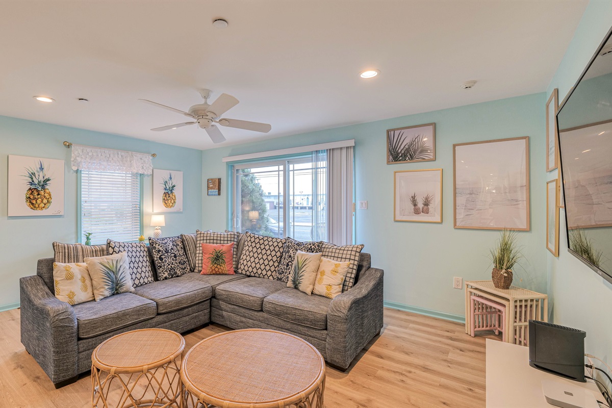 Living room area with plush seating and cute coffee tables