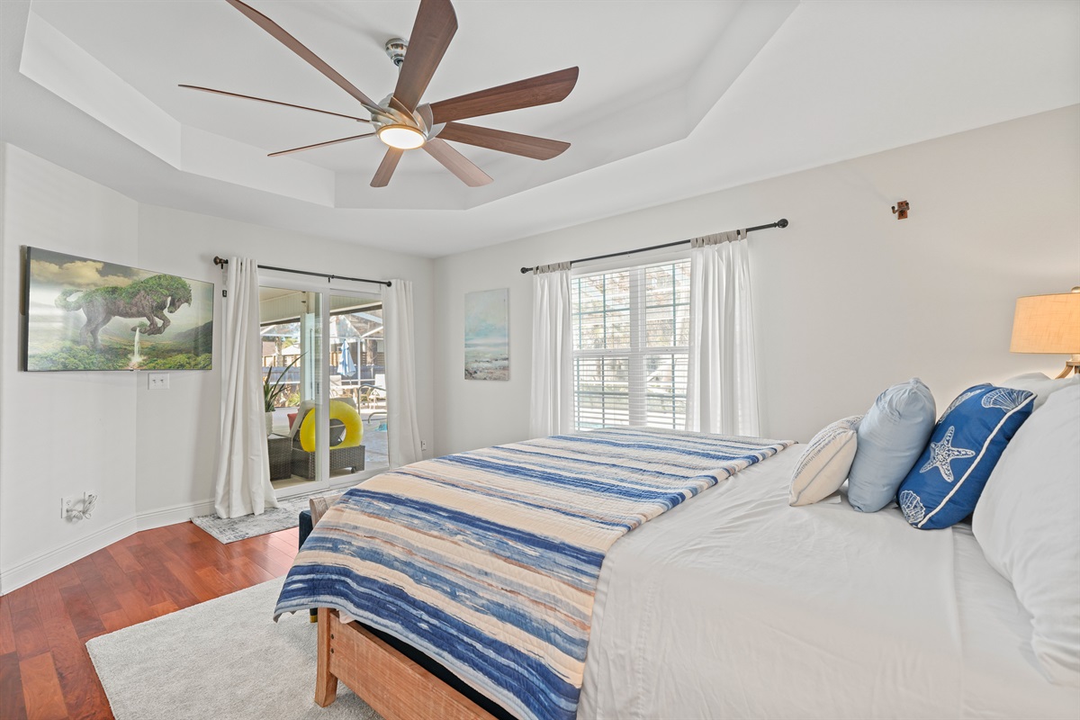 Primary Bedroom with pool view