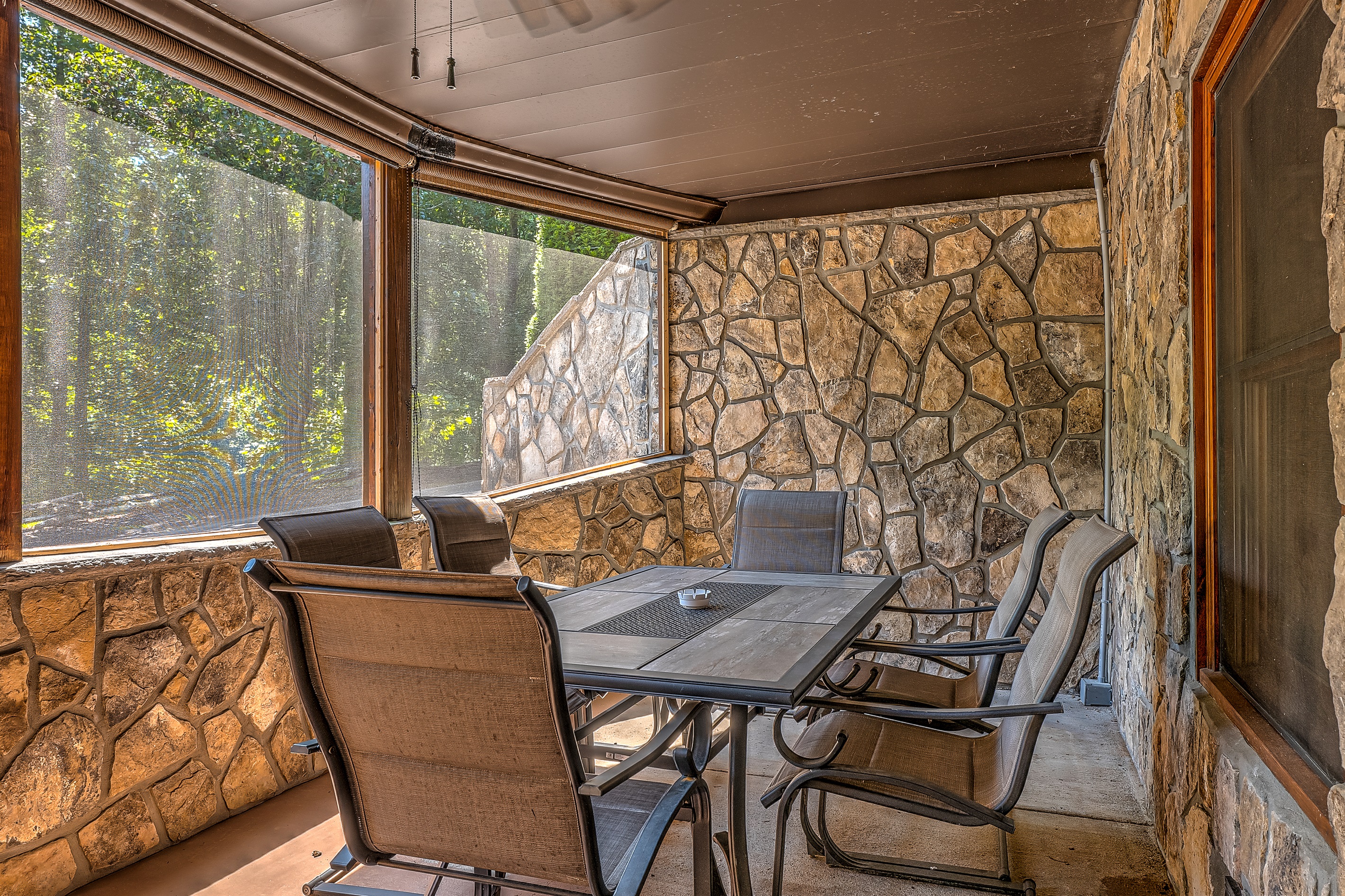 Screened in porch off basement.