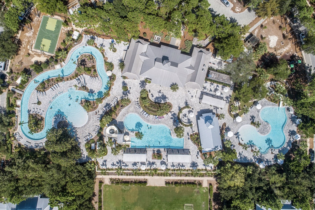 Camp Watercolor. Lazy river, slides & dining area