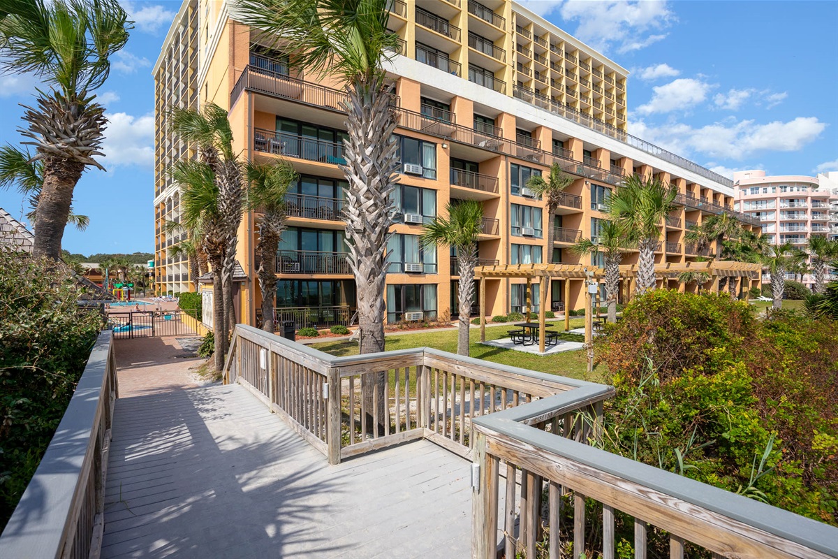 Walkway from the beach to the resort.