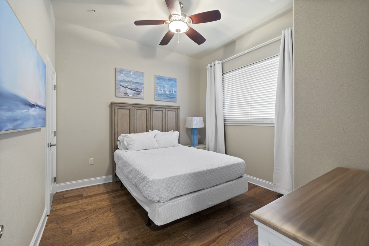 The third bedroom has a queen sized bed and plenty of space for your clothes.