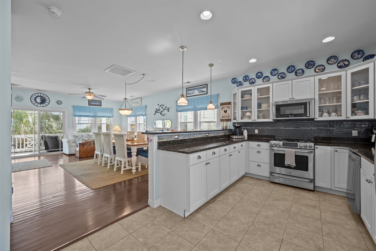 The large island is perfect for meal prep, while the dining area is ready for your next feast