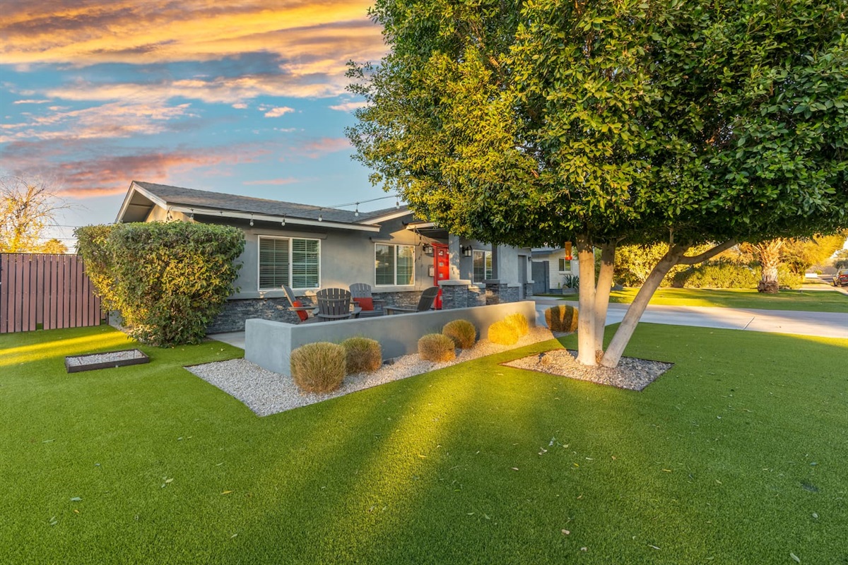 Spacious and clean front yard, offering a well-maintained and welcoming outdoor space.
