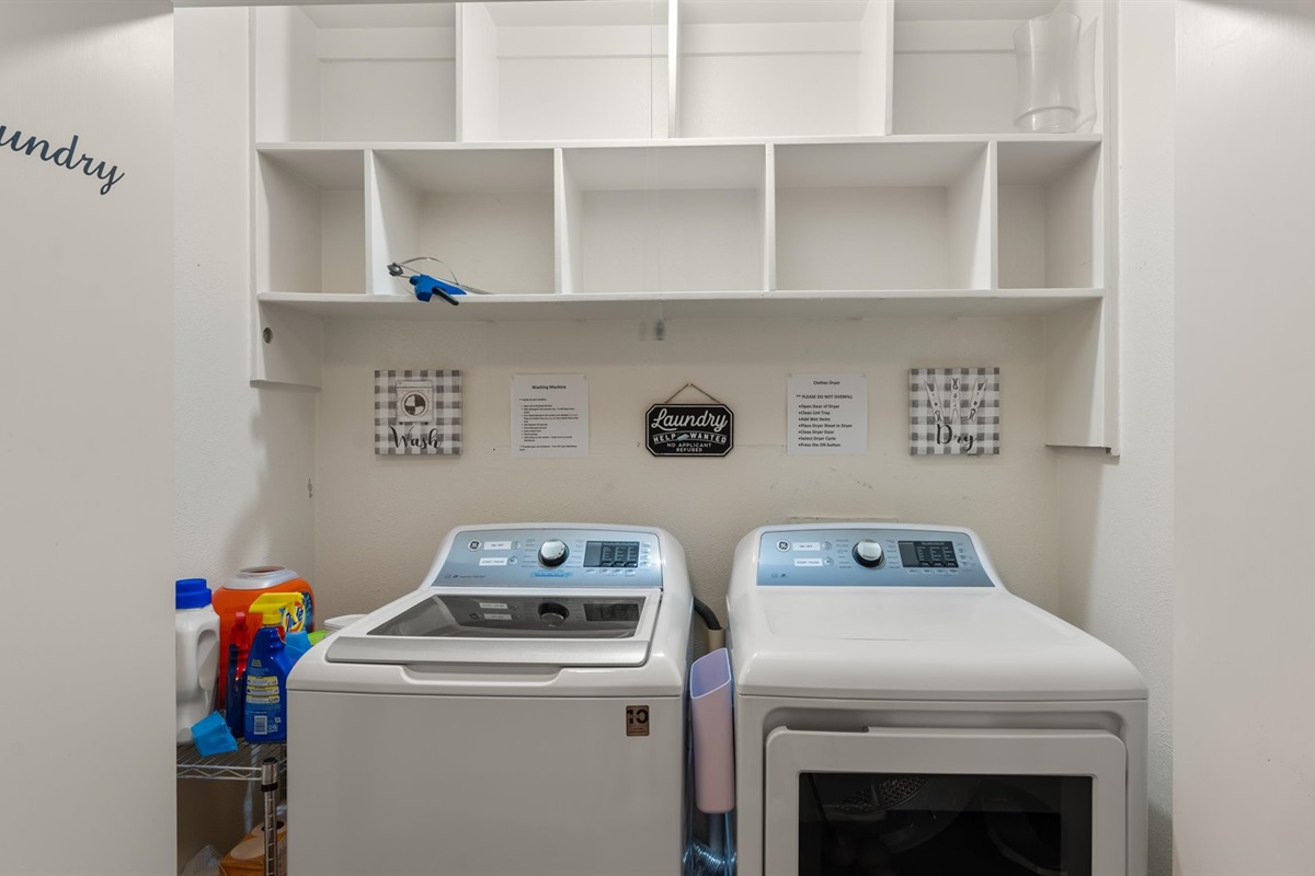 The laundry area has a full-size washer and dryer with wool balls. Tide pods, stain remover, and a laundry basket are provided for convenient laundry care during your stay.
