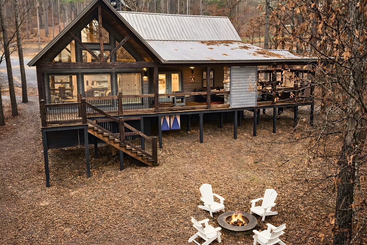 The aerial perspective showcases the serene isolation and beautiful layout of our cozy woodland cabin.