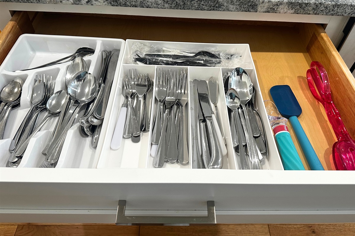 Fully stocked kitchen - silverware, wine opener, various kitchen utensils