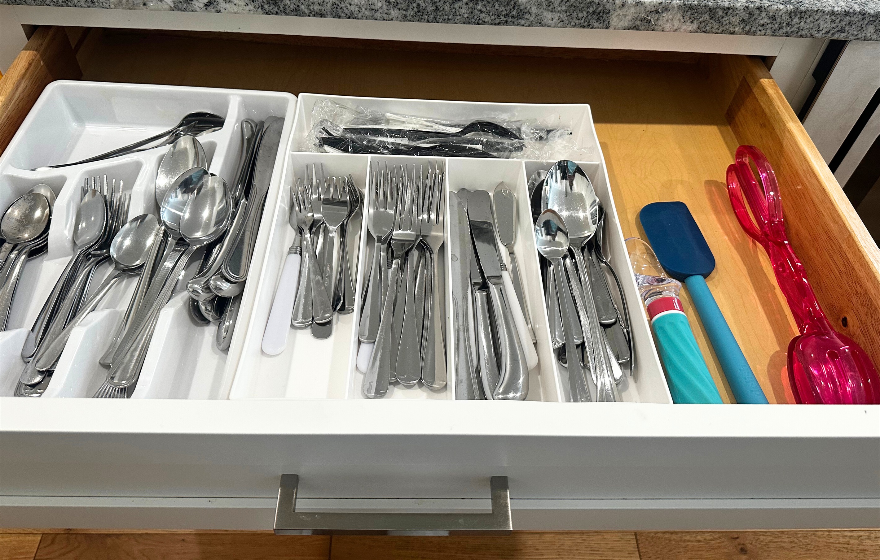 Fully stocked kitchen - silverware, wine opener, various kitchen utensils