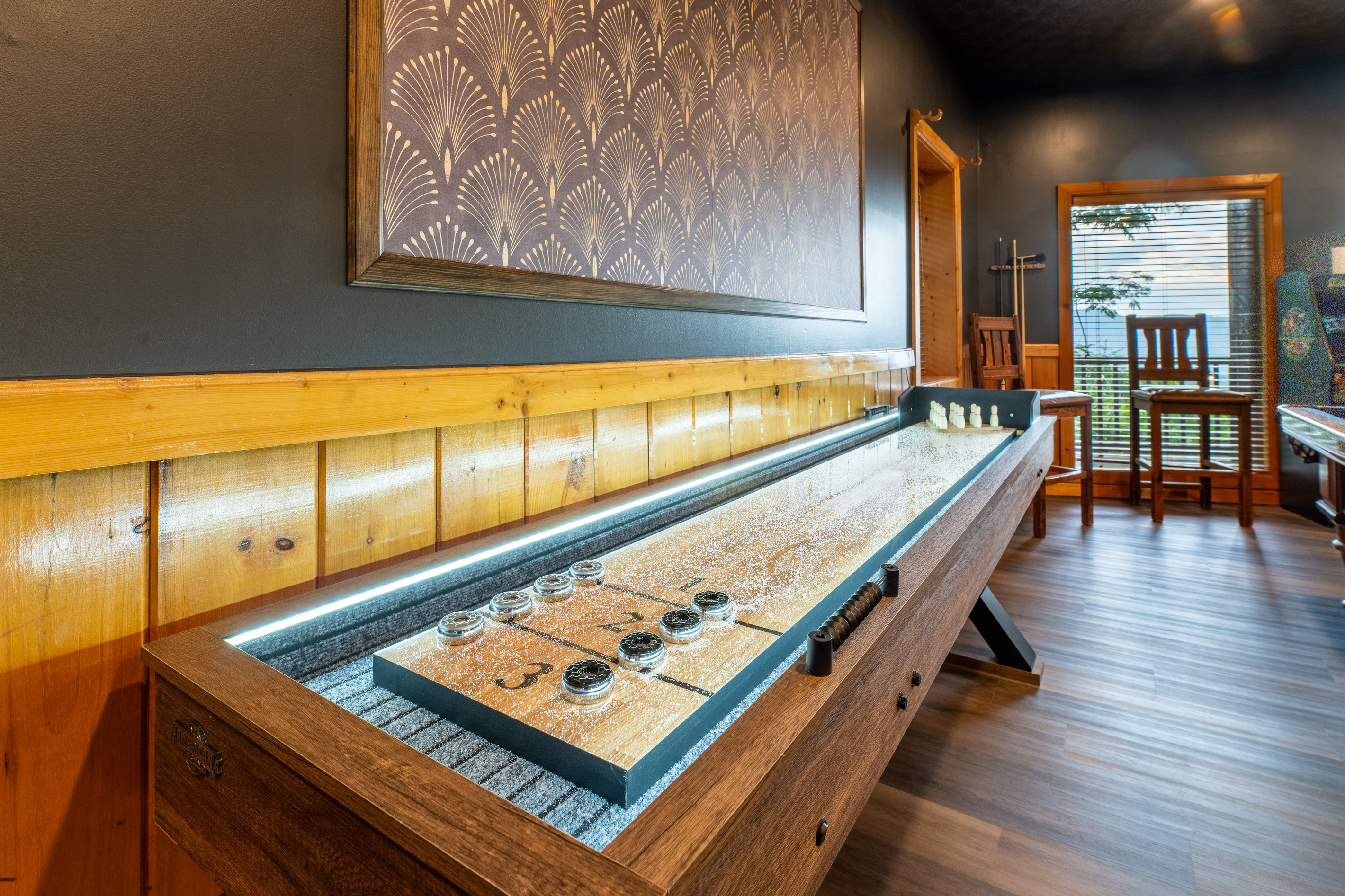 Play on the LED shuffleboard or switch it up and turn this into a bowling game.