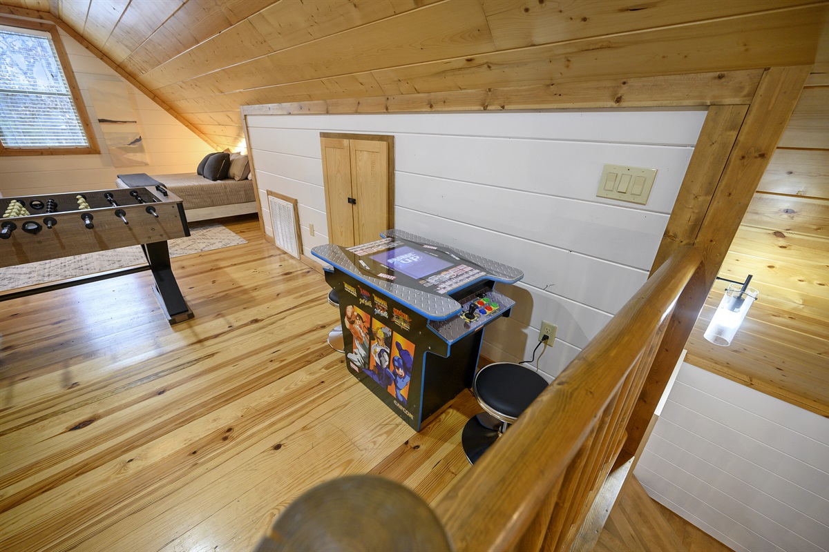 Step into nostalgia and fun in our attic arcade play area – where every game is a blast from the past!