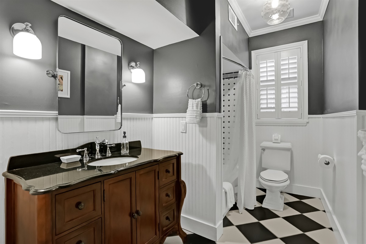 Clean and bright bathroom with fresh towels and essentials.