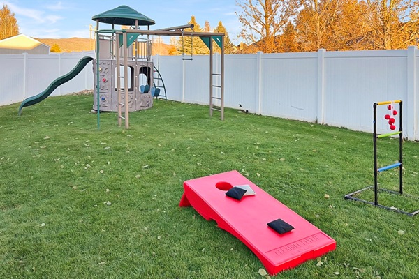 Send the kids out back to burn off some energy on the Playset, Bags and Ladder Golf!