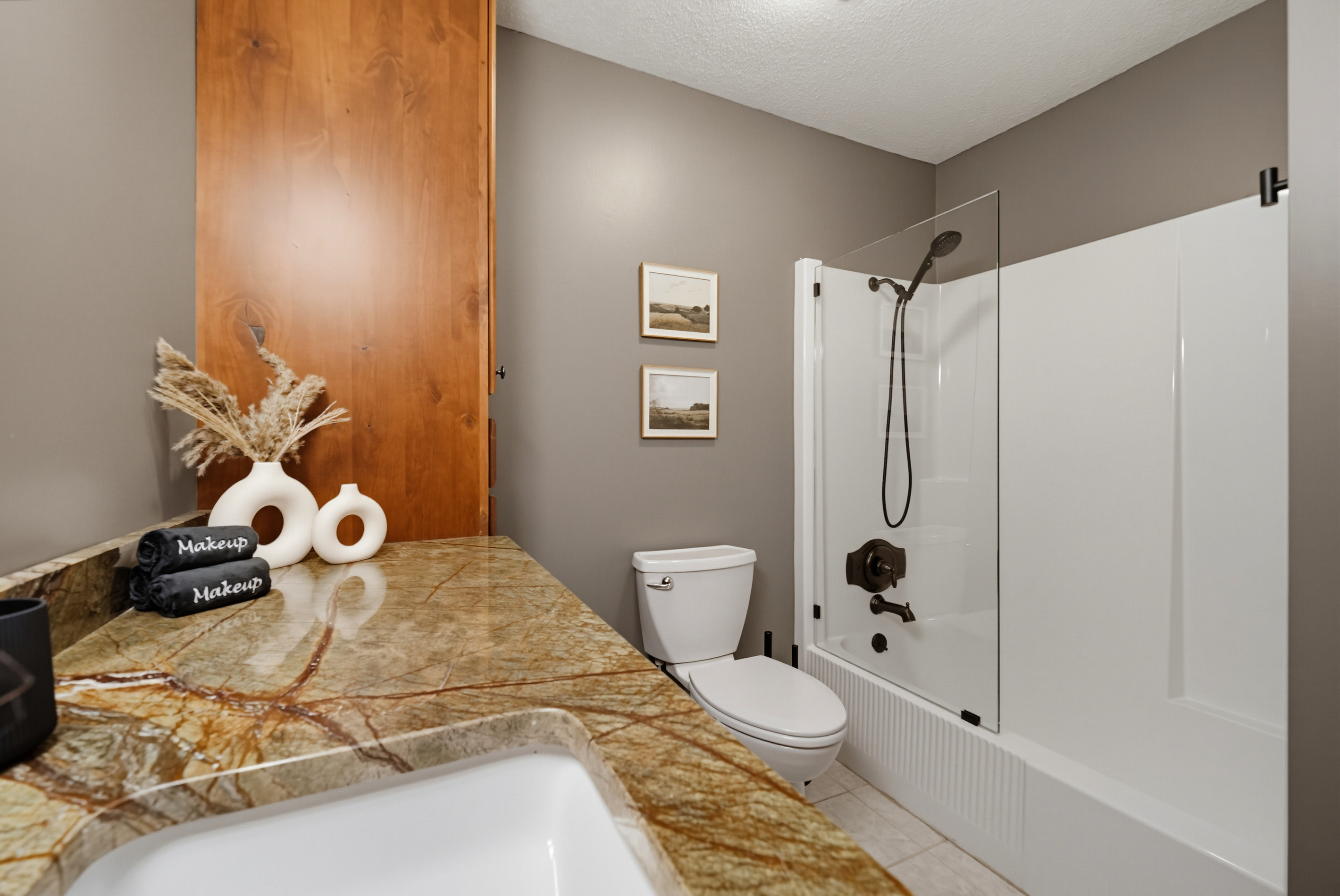 {Bath 2} Bright, welcoming, and thoughtfully designed, this full bathroom offers generous counter space and modern finishes for a comfortable stay.