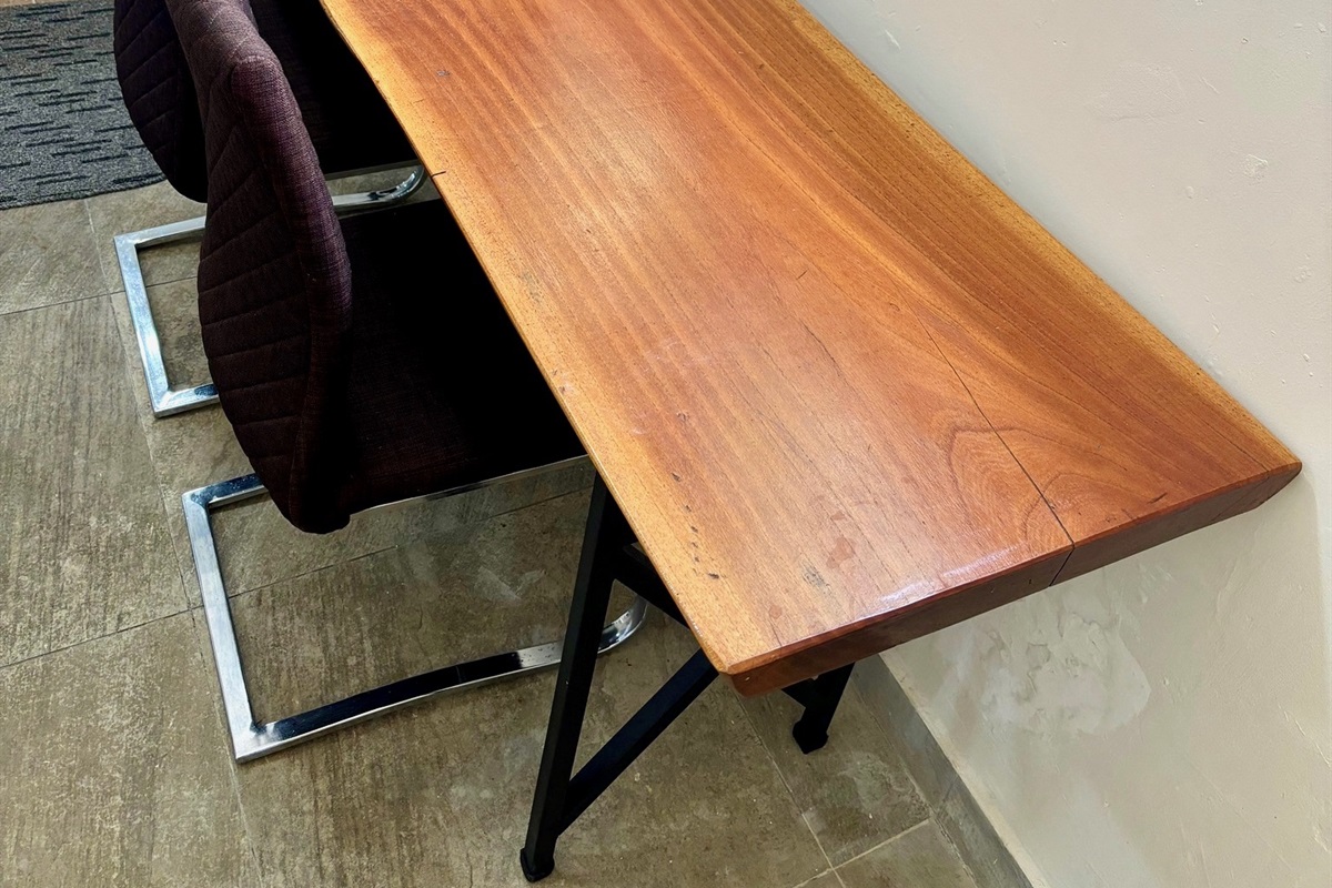 A sturdy desk is available for remote working or hosting dinners outside