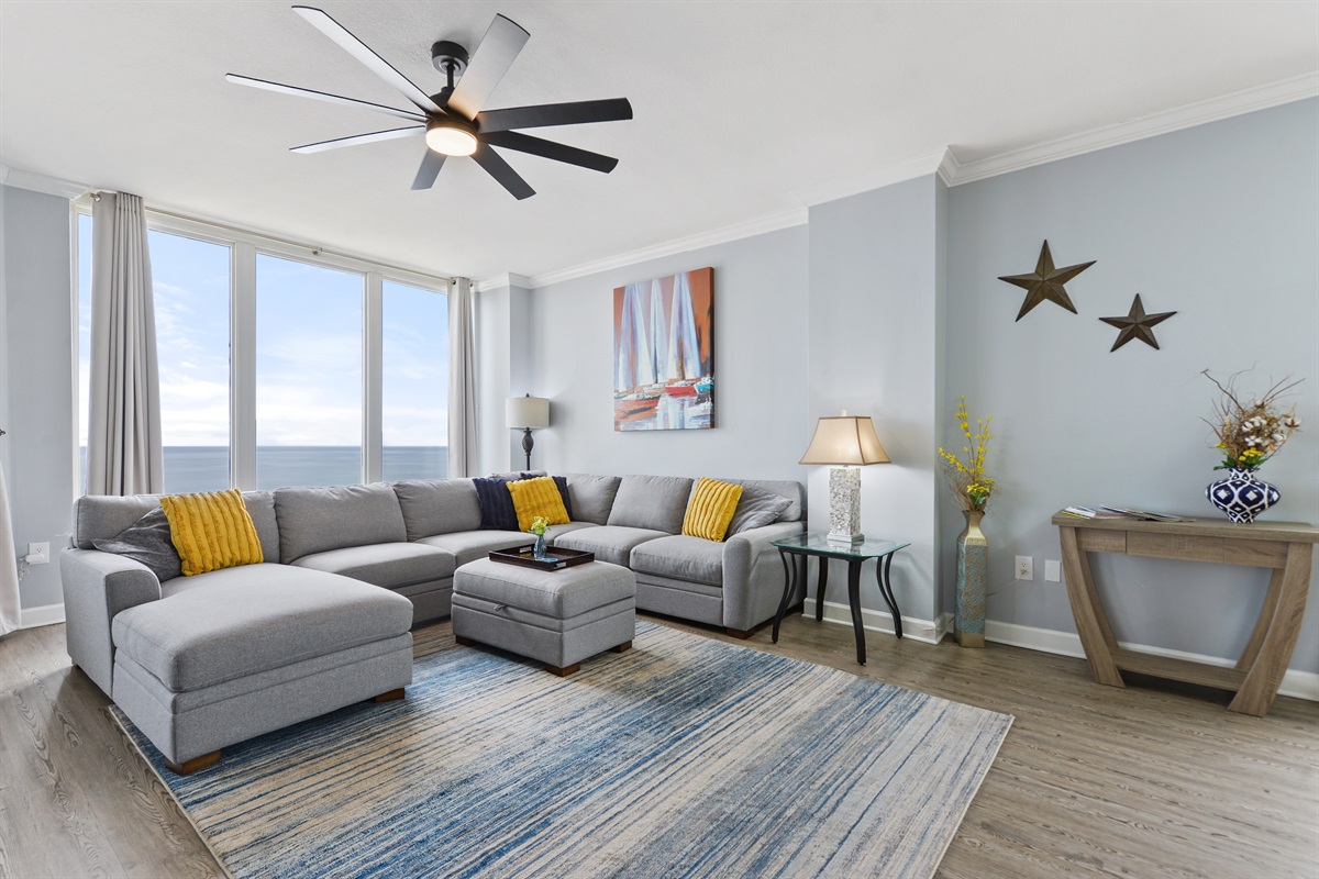 Living room; 60" 4k Roku TV, oversized sectional sofa. 