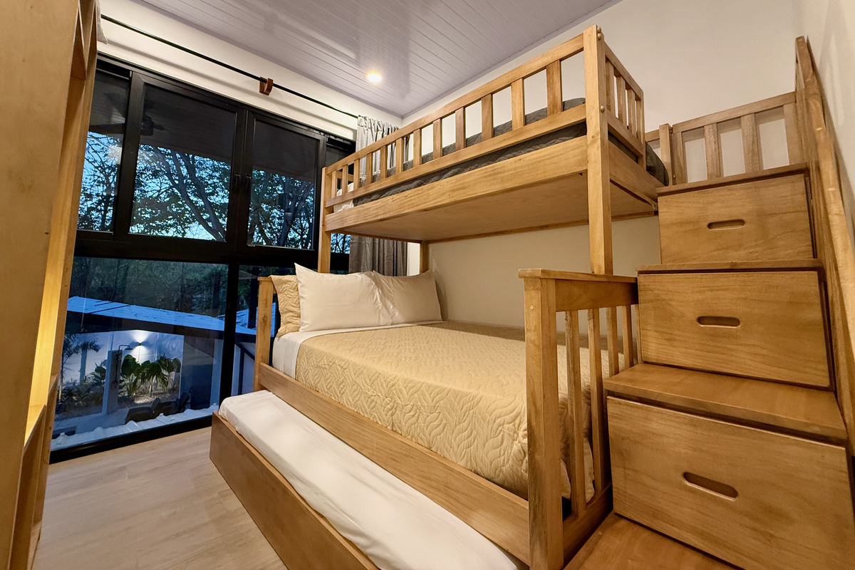 Extra pull-out bed below. Great for toddlers!