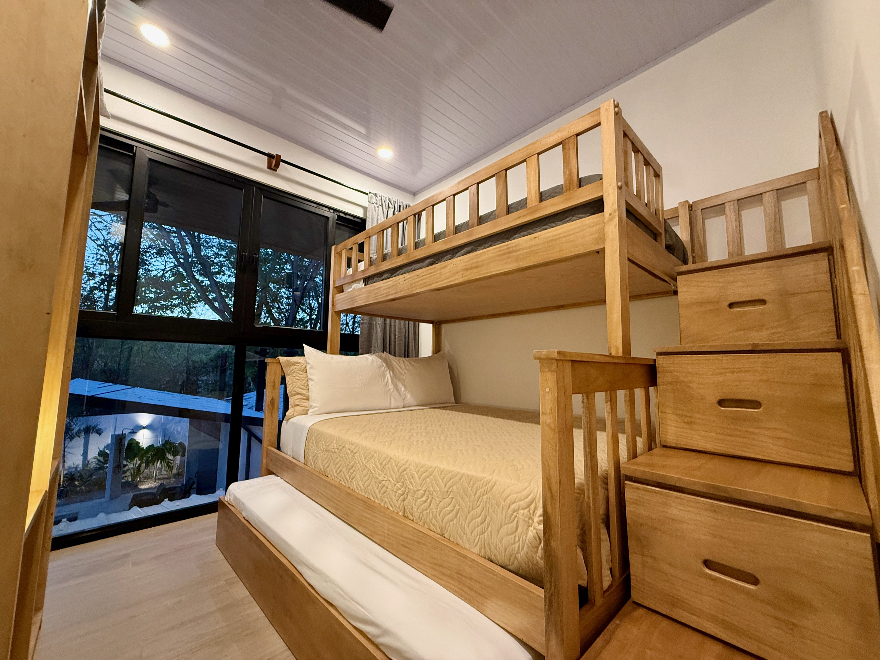Extra pull-out bed below. Great for toddlers!