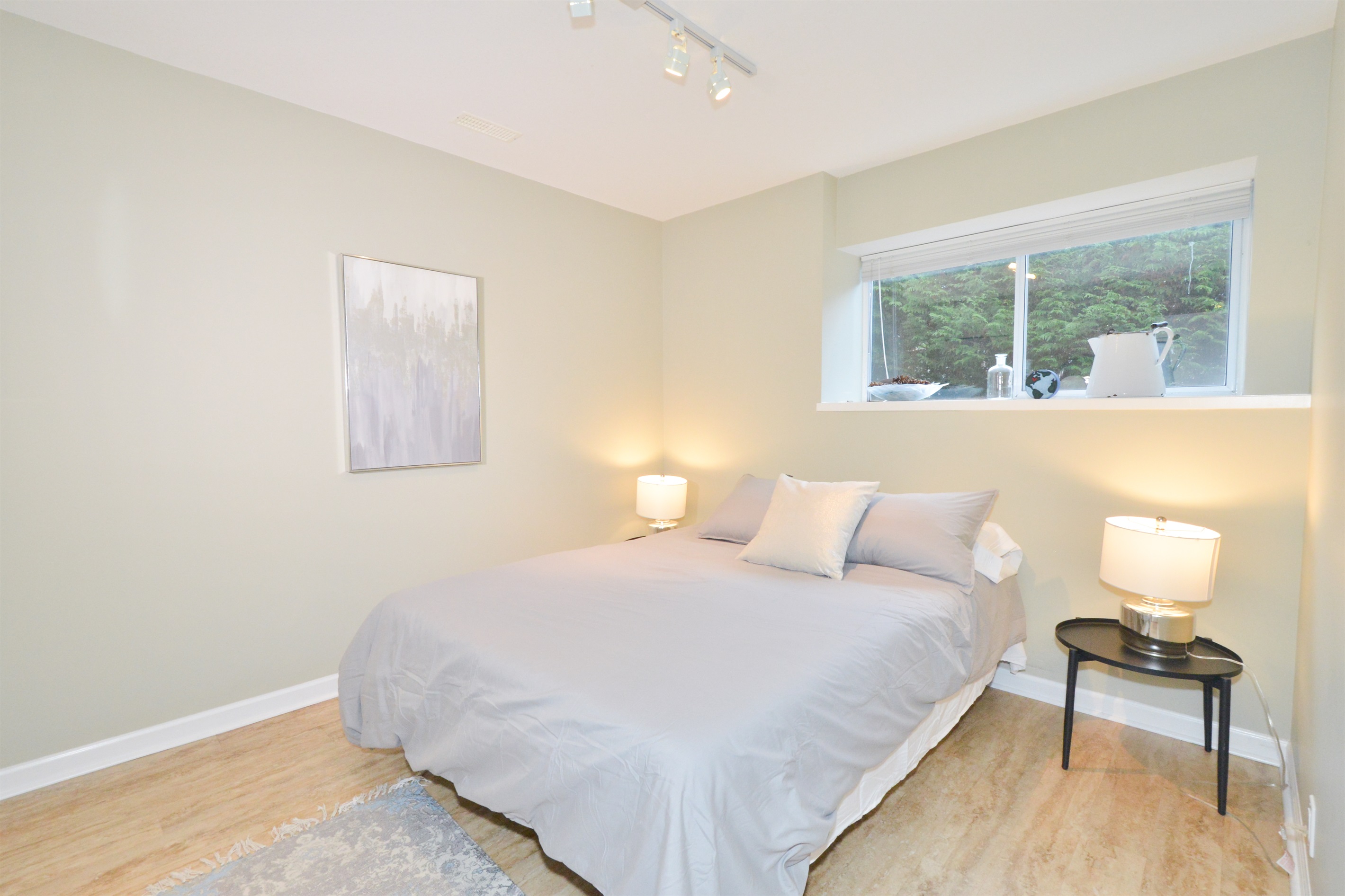 Queen bedroom 2 with soft lighting